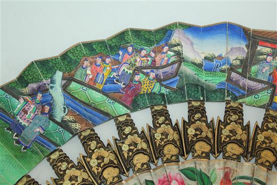 A Chinese applique work painted leaf and gilt decorated black lacquer fan, 19th century, 31cm